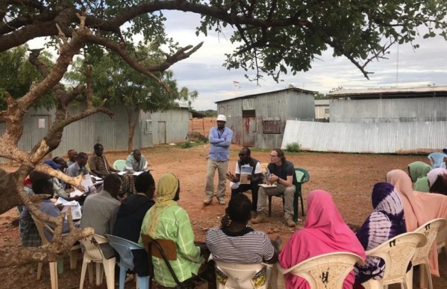 Researchers present findings from the first Dollo Ado report to members of the Somali Refugee Central Committee