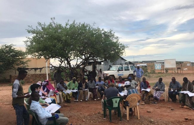 Researchers present findings from the first Dollo Ado report to members of the Somali Refugee Central Committee